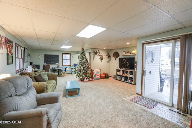 202 Arbor Dr, Lamar, MO 64759 - carpeted living room featuring a paneled ceiling