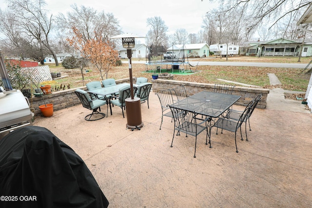 202 Arbor Dr, Lamar, MO 64759 - view of patio featuring a trampoline