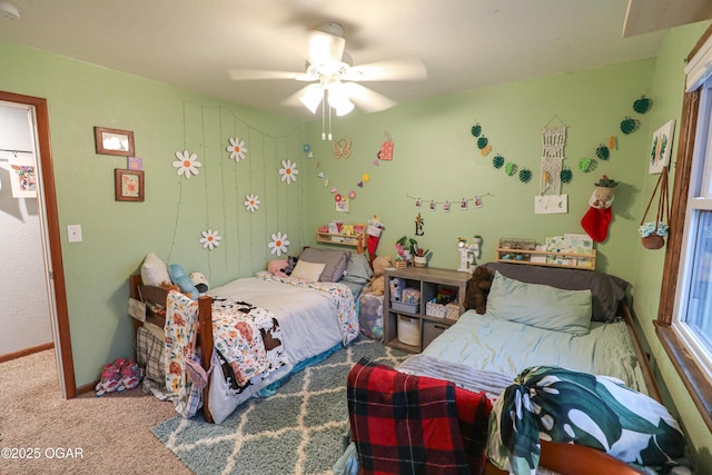 202 Arbor Dr, Lamar, MO 64759 - bedroom with ceiling fan and carpet floors