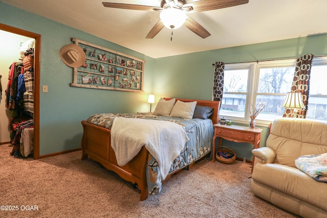 202 Arbor Dr, Lamar, MO 64759 - bedroom featuring carpet, ceiling fan, a walk in closet, and a closet