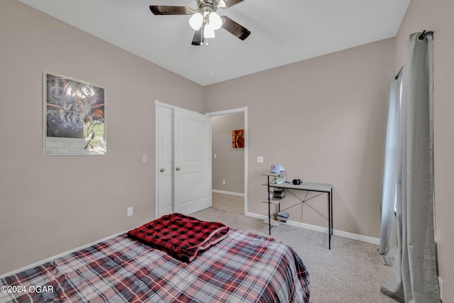 bedroom with light colored carpet and ceiling fan