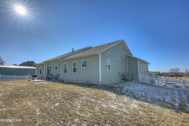 rear view of property featuring a patio area