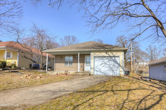 view of front facade featuring a front yard and a garage