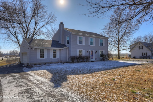 colonial-style house with a garage