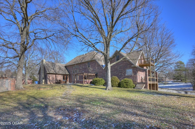 exterior space featuring a front lawn