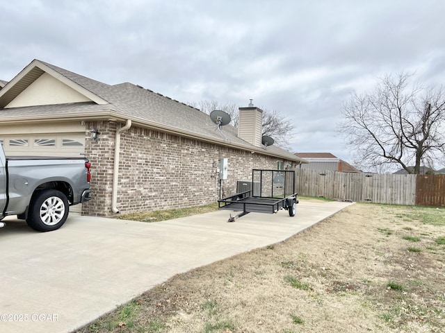 exterior space with a garage