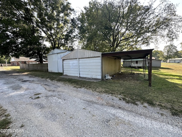 garage with a yard