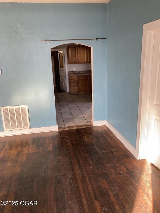 spare room with light wood-type flooring