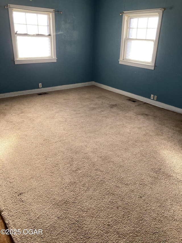 view of carpeted spare room