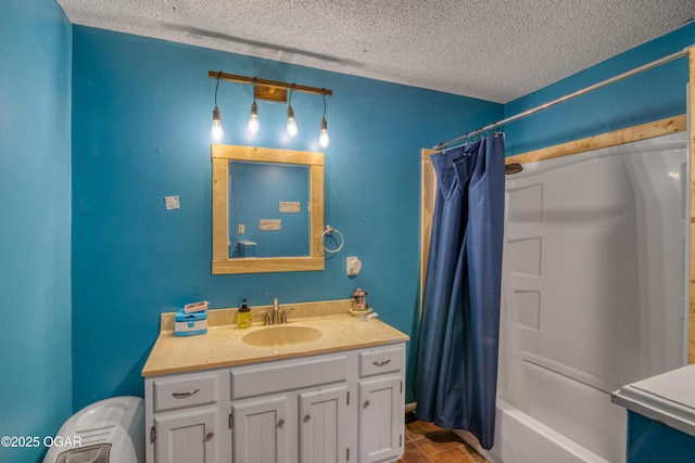 bathroom featuring vanity, shower / bath combo with shower curtain, and a textured ceiling