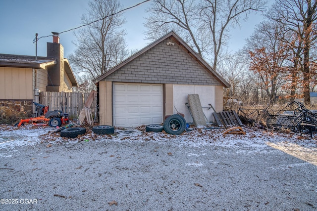 view of snow covered garage