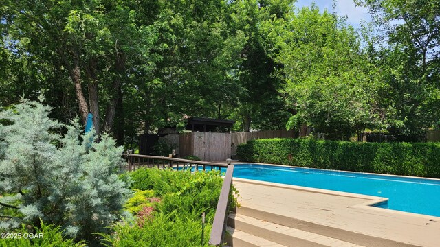 2007 E 47th St, Joplin, MO 64804 - view of swimming pool featuring a deck
