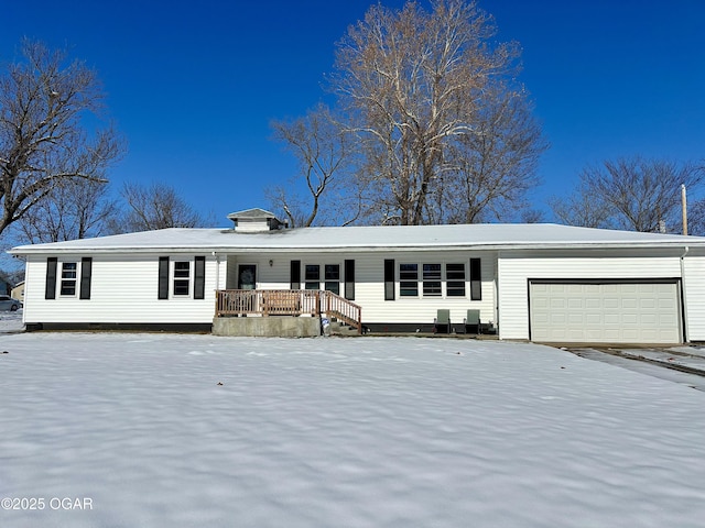 view of front of property featuring a garage and a porch