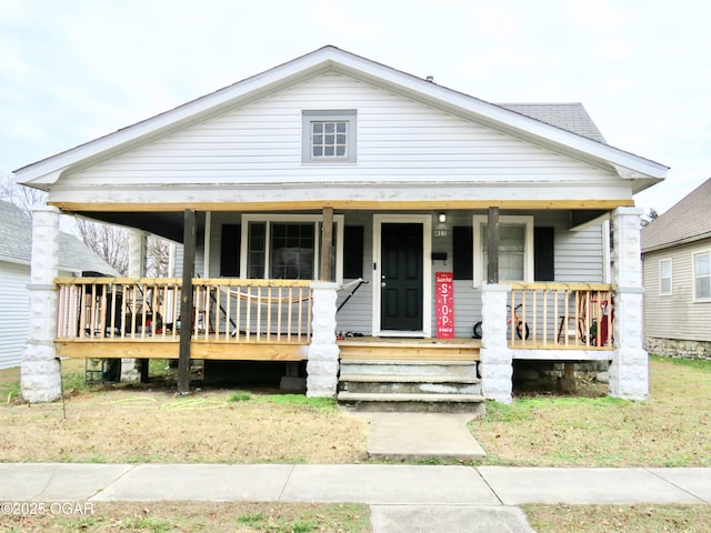 view of front of home featuring covered porch