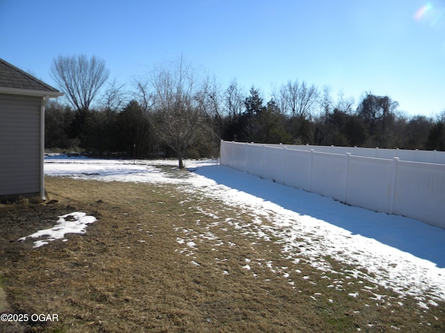 view of snowy yard