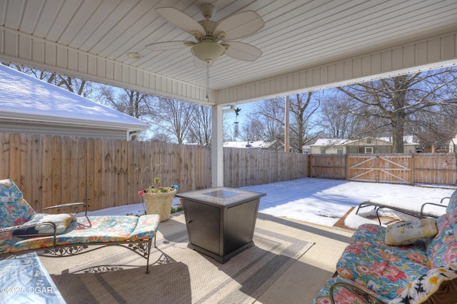 wooden deck with ceiling fan and a patio area