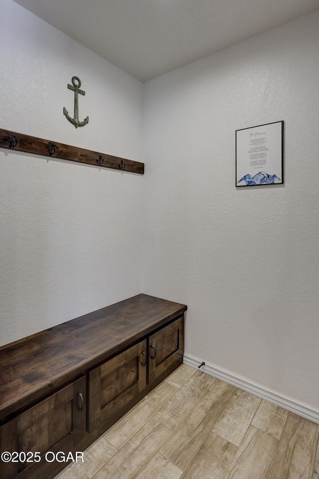 mudroom with light wood-type flooring