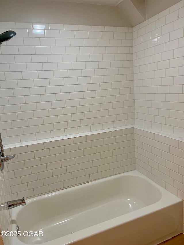 bathroom featuring bathing tub / shower combination