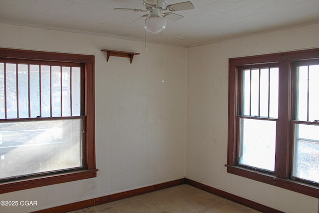 spare room featuring ceiling fan