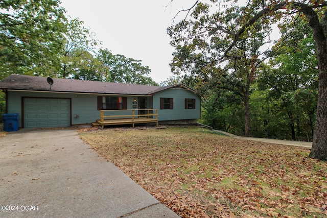 ranch-style home featuring a garage