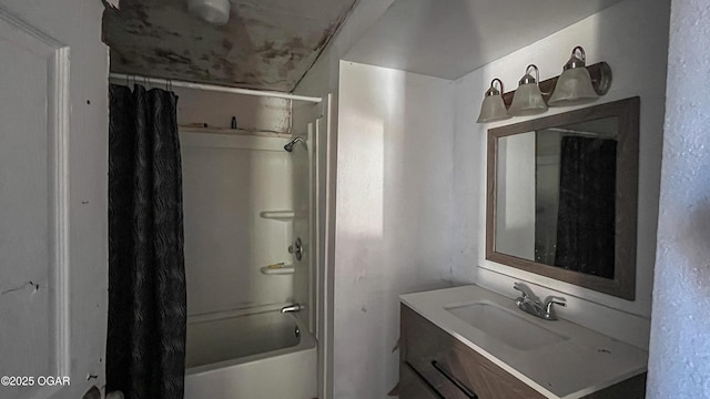 bathroom featuring vanity and shower / bath combo with shower curtain