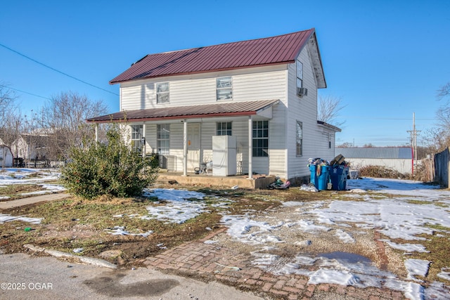 view of front of home featuring covered porch