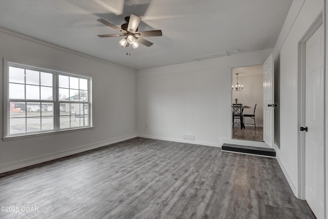 unfurnished room with wood-type flooring and ceiling fan with notable chandelier