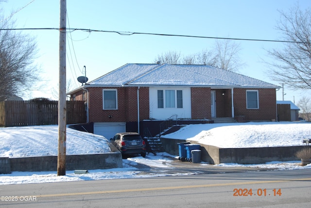 single story home with a garage