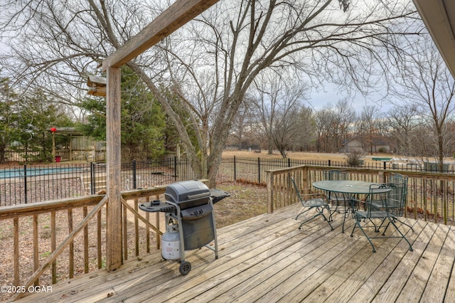 wooden deck featuring grilling area