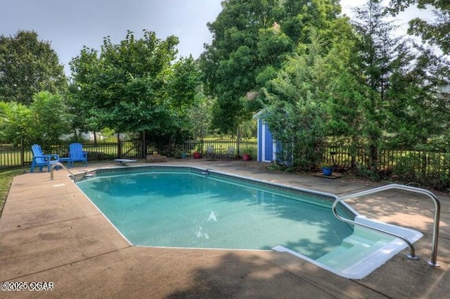 view of pool featuring a patio area