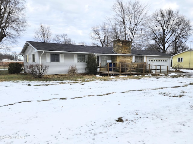 single story home with a garage