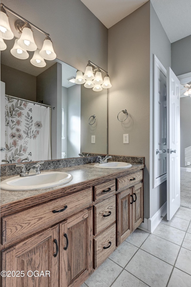 bathroom featuring vanity and tile patterned flooring