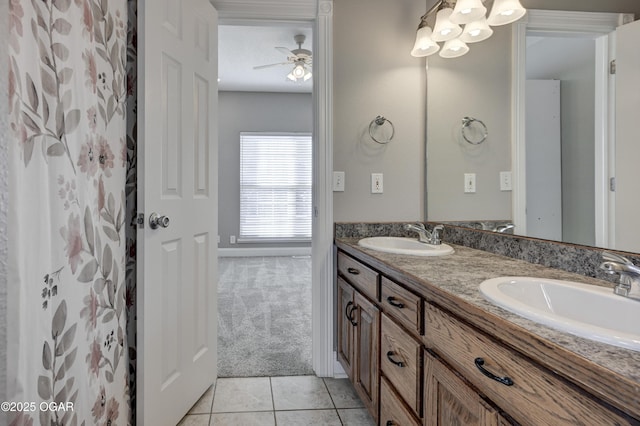 bathroom featuring ceiling fan, tile patterned floors, and vanity