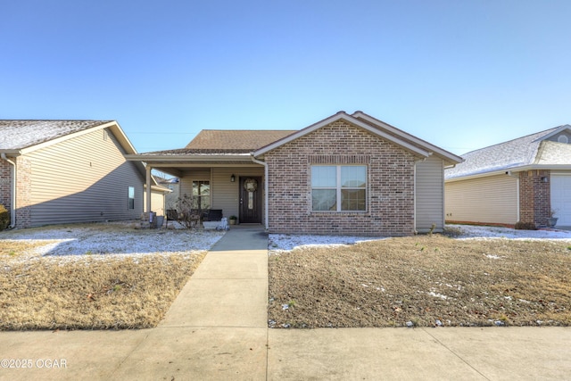 ranch-style house with covered porch