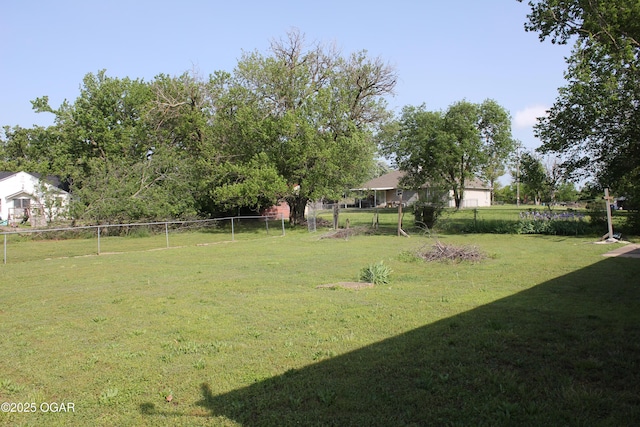 view of yard featuring fence
