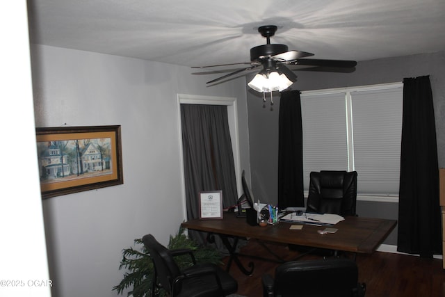 office area featuring a ceiling fan and wood finished floors