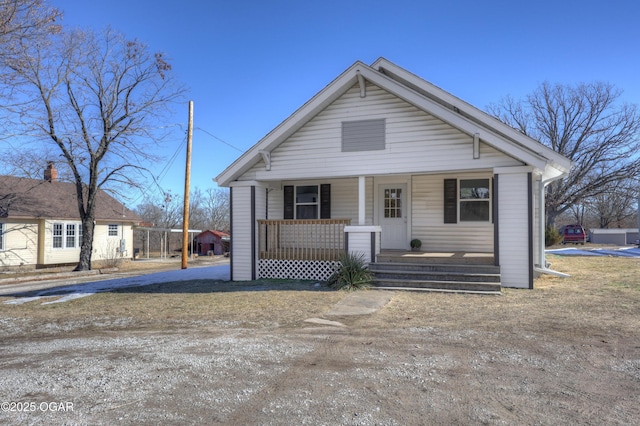 bungalow-style home featuring covered porch