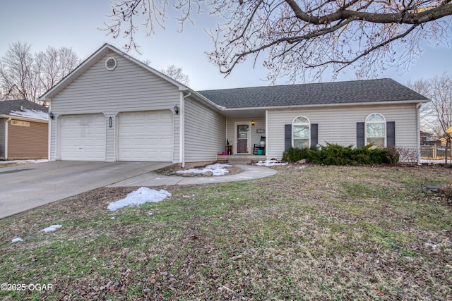 single story home featuring a garage