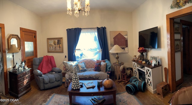 living room featuring dark wood-type flooring and a notable chandelier