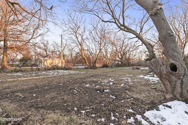 view of yard covered in snow