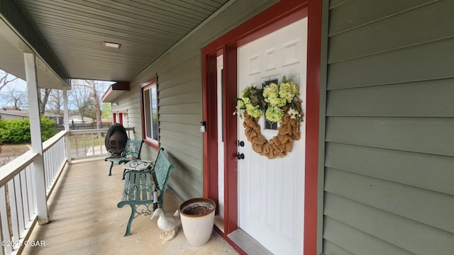 6539 SE Quaker Rd, Galena, KS 66739 - doorway to property with covered porch
