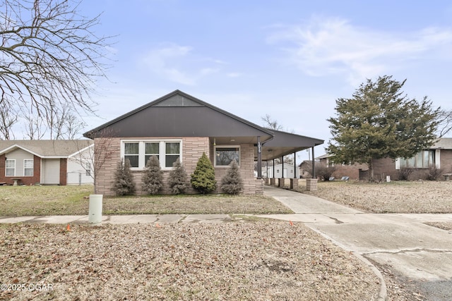 view of front of house featuring a carport