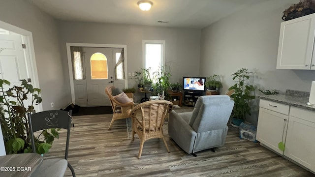 living area featuring dark hardwood / wood-style flooring