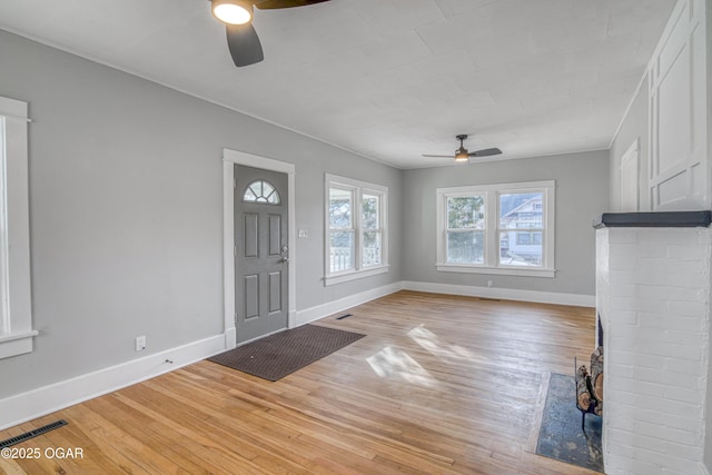 entrance foyer with light hardwood / wood-style floors and ceiling fan