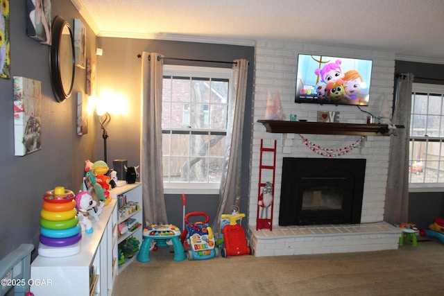 carpeted living room featuring a textured ceiling, ornamental molding, and a fireplace