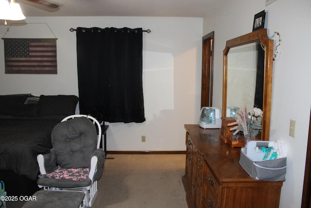 bedroom featuring ceiling fan and light colored carpet