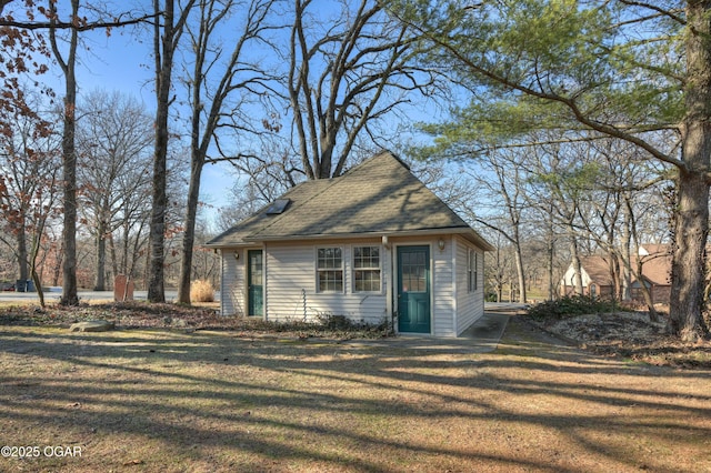 exterior space with a yard