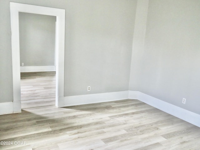 empty room with light wood-type flooring