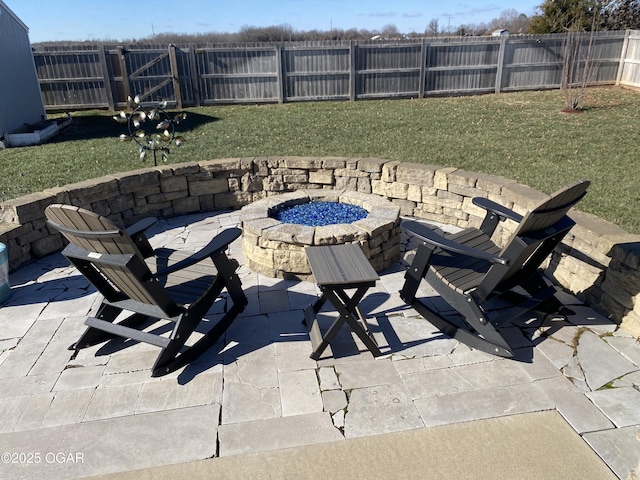 view of patio / terrace with a fire pit