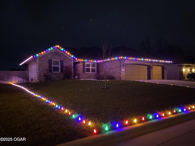 view of front of home with a garage